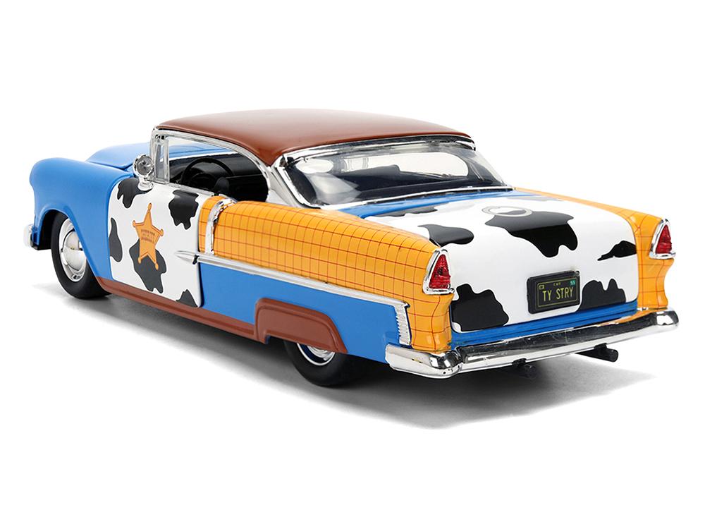 1955 Chevrolet Bel Air Blue with Graphics and Woody Diecast Figure