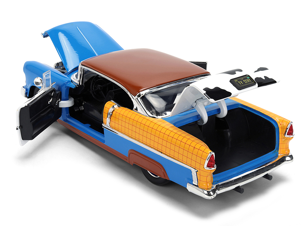 1955 Chevrolet Bel Air Blue with Graphics and Woody Diecast Figure