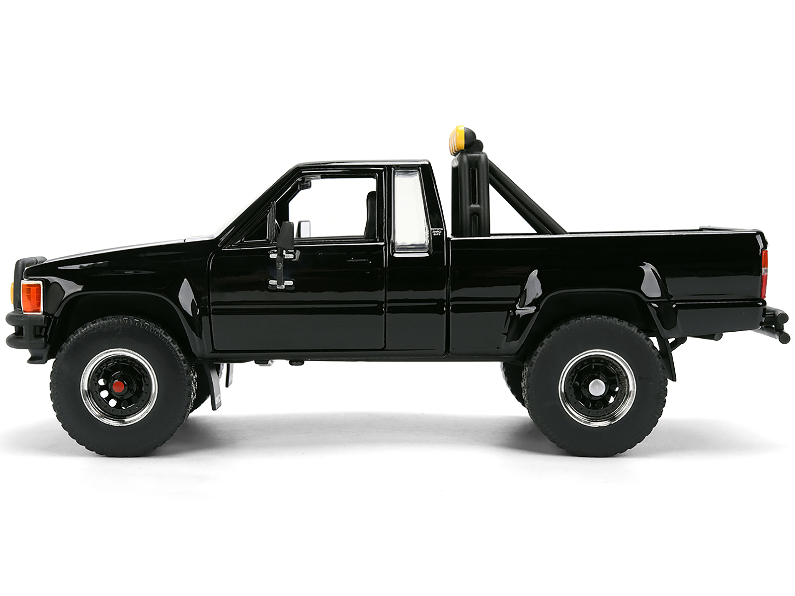 1985 Toyota SR5 Pickup Truck Black with Marty's Skateboard 