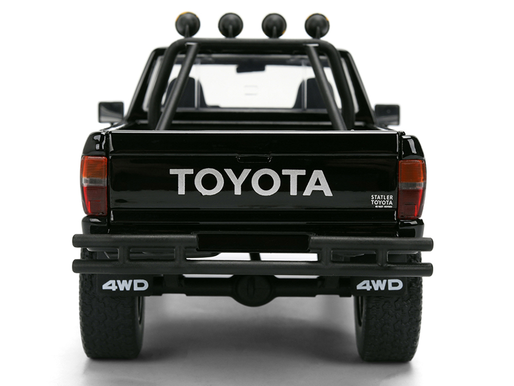 1985 Toyota SR5 Pickup Truck Black with Marty's Skateboard 