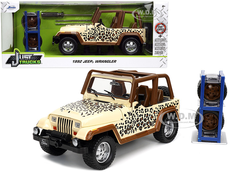 1992 Jeep Wrangler Tan and Graphics and Extra Wheels "Just Trucks" Series Brown 1:24 model Jada