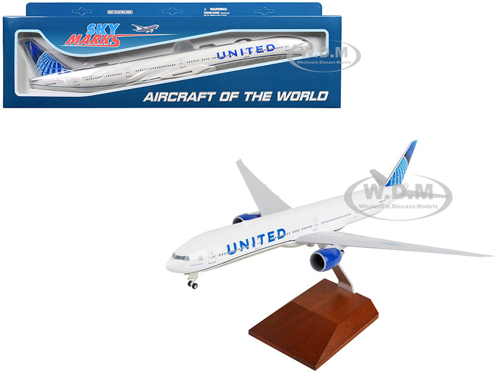 Boeing 777-300 Commercial Aircraft "United Airlines" (N2749U) White with Blue Tail with Wood Stand (2019 Livery) (Snap-Fit) 1/200 Plastic Model by Sky