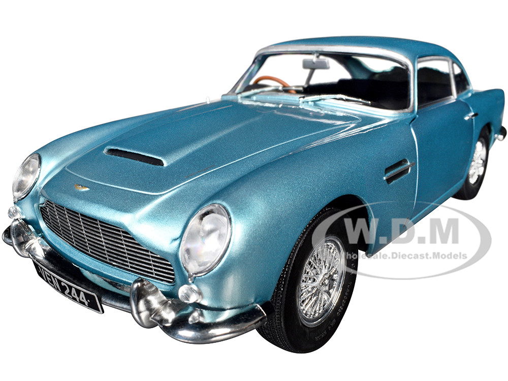 1964 Aston Martin DB5 RHD (Right Hand Drive) Light Blue Metallic 1/18 Diecast Model Car by Solido