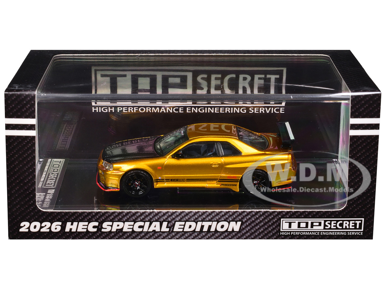 2026 Nissan "Top Secret" Skyline GT-R (BNR34) RHD (Right Hand Drive) Carbon Hood "Hobby Expo China " Gold 1:64 model BM Creations