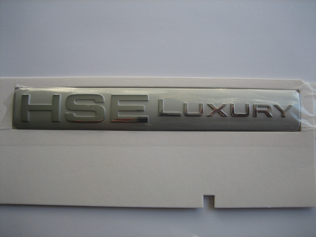 HSE LUXURY Badge - LR032455