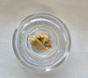 Premium solventless THCA Live Rosin by Blazed Frog, Gummy Bear OG strain. High-potency hemp-derived concentrate with less than 0.3% Delta-9 THC, sold at GreenRX Sun Prairie and smoke shop.