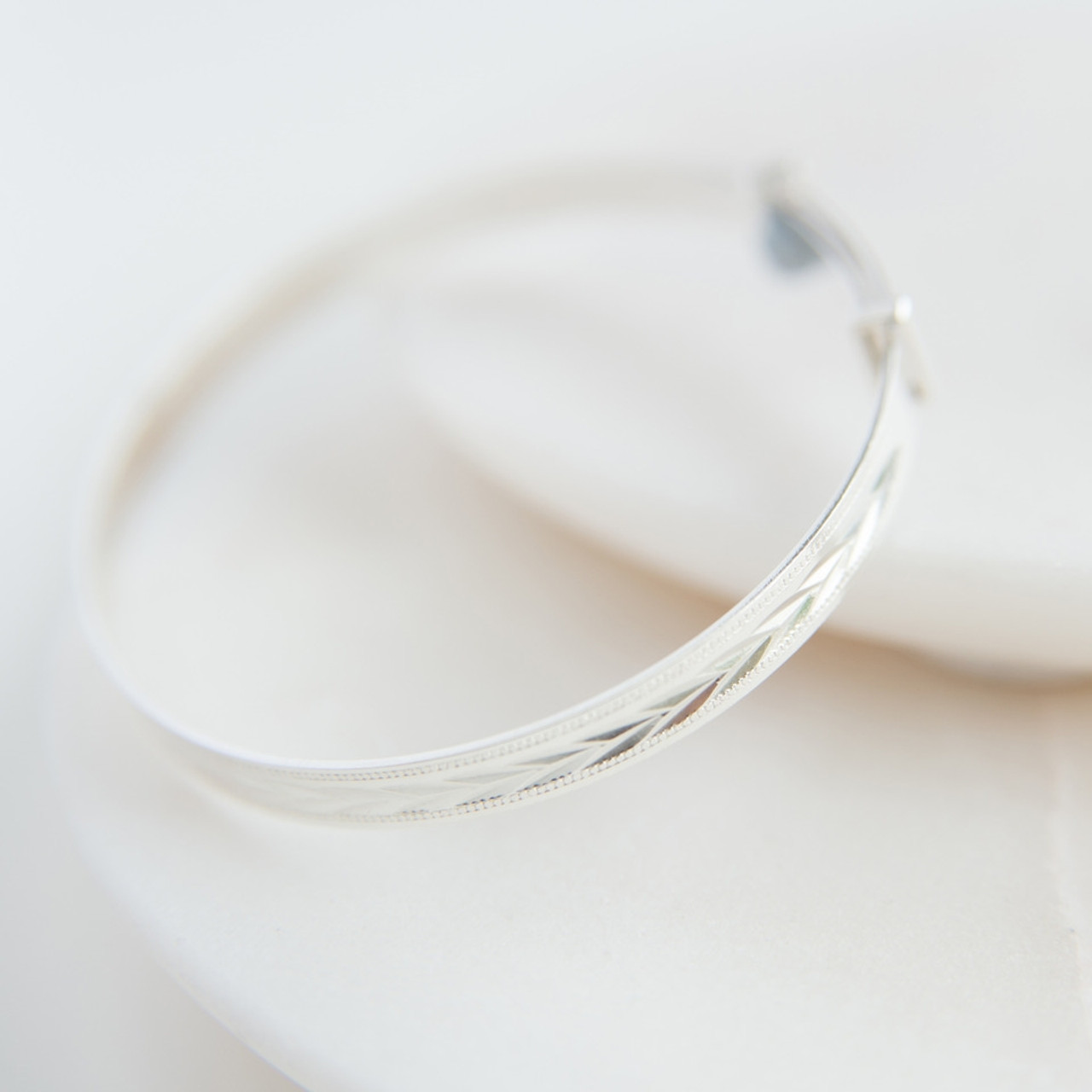 Silver on sale christening bangle