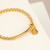 Gold St Christopher Baby Bracelet