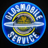 OLDSMOBILE SERVICE NEON SIGN WITH BACKING