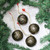 Papier Mache Ornaments in Black and Gold (Set of 4) 'Night of Cheer' Papier Mache Ornaments in Black and Gold (Set of 4) 'Night of Cheer'