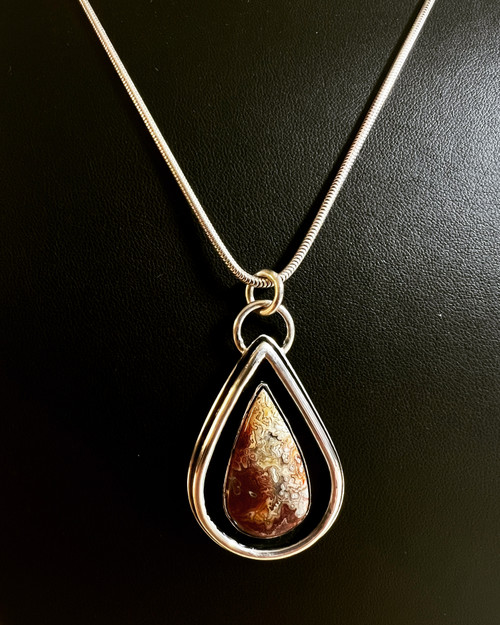 Custom Handcrafted Sterling Silver Agate Pendants.
