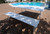 White Air Table with 2 Matching Benches outdoors White Air Table with 2 Matching Benches outdoors