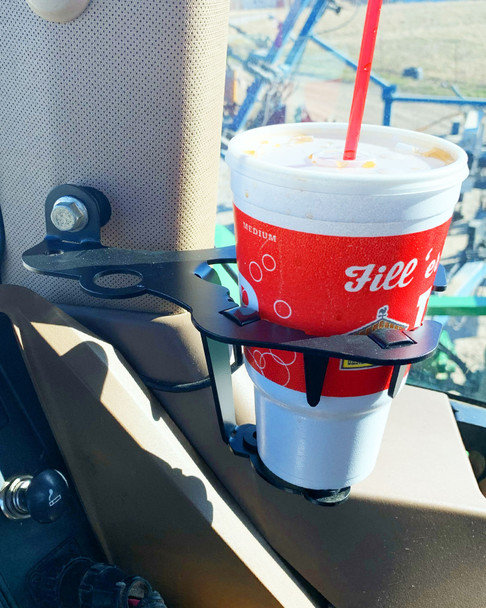 Universal metal cupholder for the cab of farm equipment.  It can replace a John Deere BRE10152