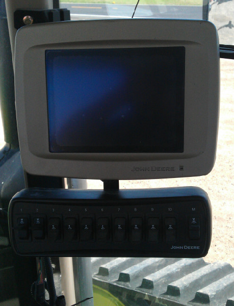 Ten Switch Controller with 2600 John Deere display with bracket installed on back of display.