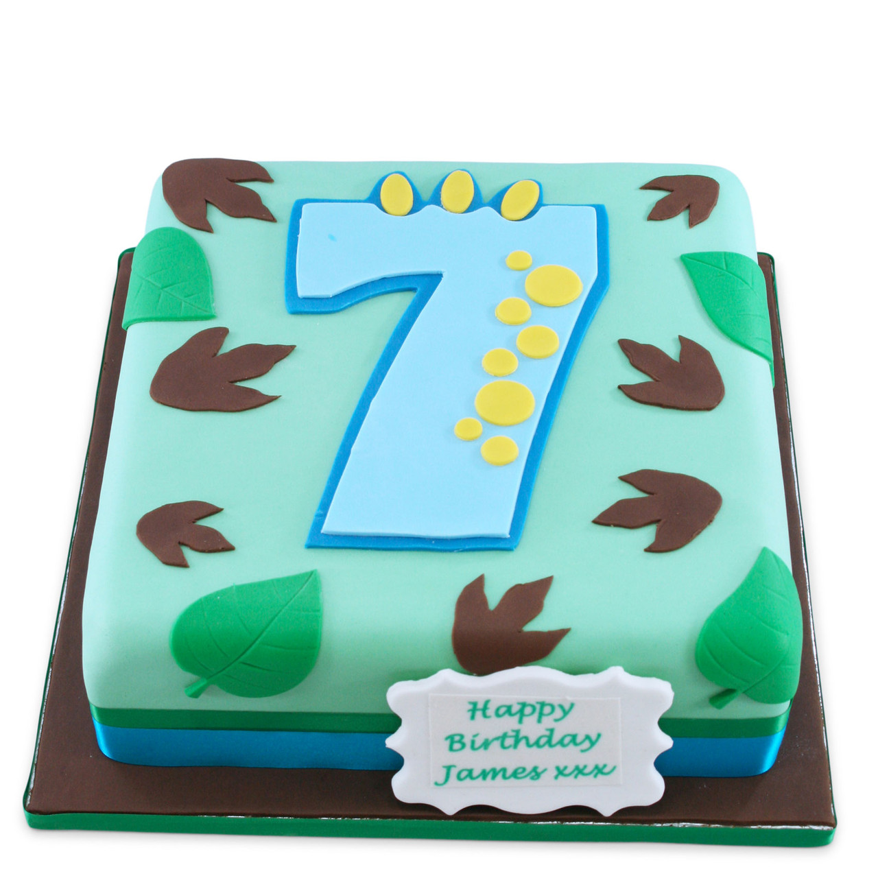 Number 7 shaped chocolate birthday cake with lit candle Stock Photo - Alamy