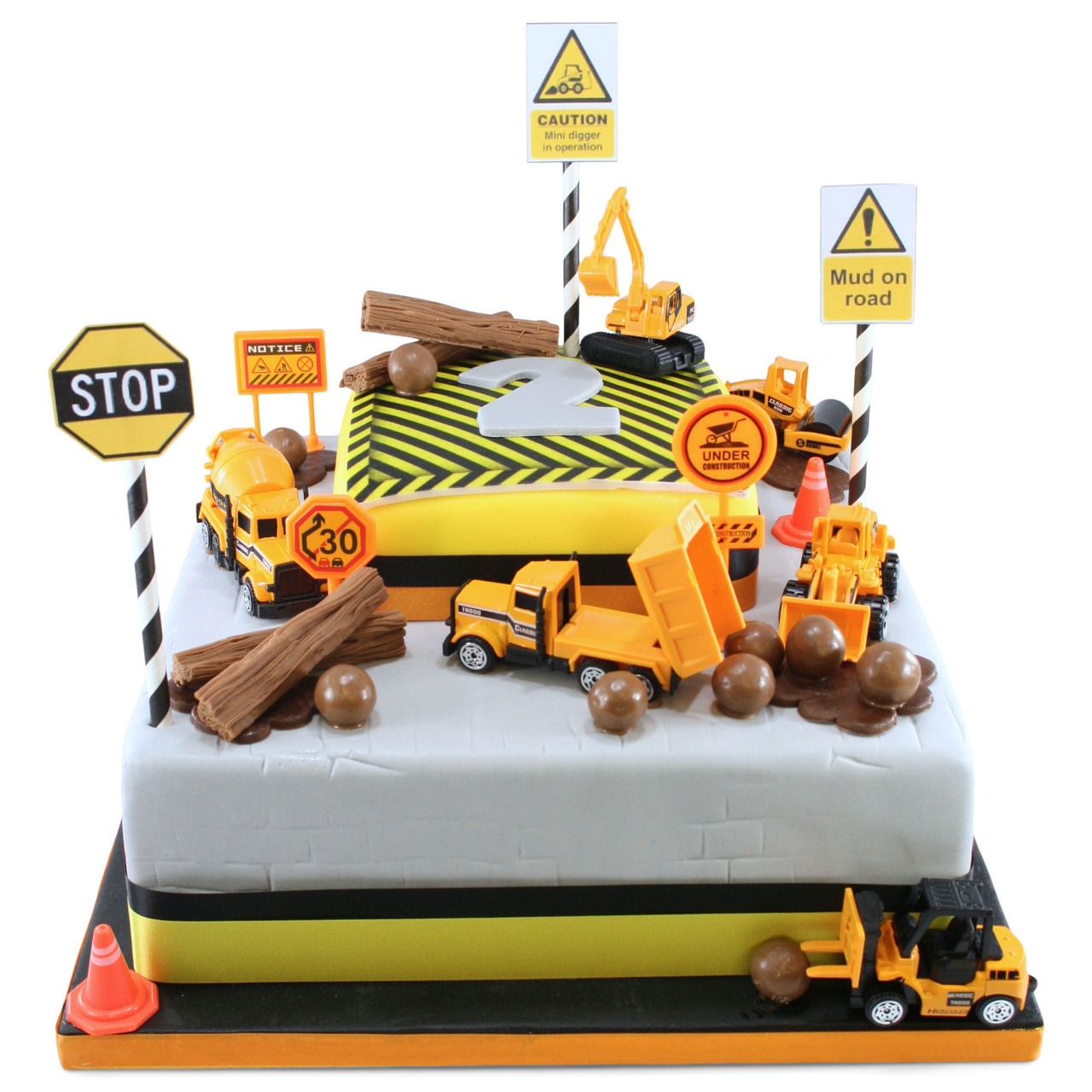 Triple chocolate digger cake, with white buttons and 3 free toys - IGO Cafe