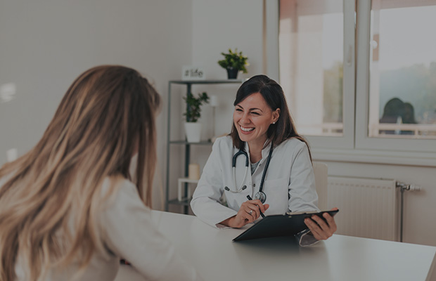 a woman with her doctor