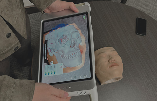 iPad in surgery showing an augmented reality overlay
