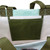 Double stitched pocket and handles in natural moss green Double stitched pocket and handles in natural moss green