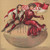 Digital Print - Football player and cheerleader sitting on giant football with Cornell flag by F. Earl Christy