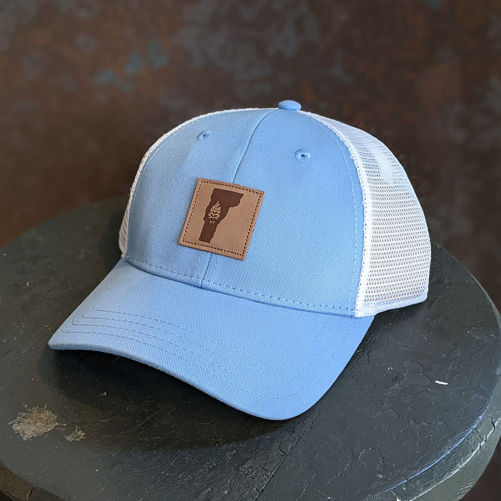 Roam VT Leather Patch Trucker Hat: Carolina Blue Roam VT Leather Patch Trucker Hat: Carolina Blue