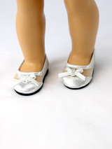 Fits 18" dolls like American Girl doll

These 18" doll shoes are utterly gorgeous with their silver see-through mesh. They have solid toes that beautifully enhance their overall design, and sweet bow details adorn the front, adding a touch of elegance. These shoes are easy to wear, thanks to their convenient slip-on style. Your doll will feel like a true fashionista with these stunning shoes in her wardrobe.
