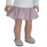 Fits 18" dolls like American Girl and Our Generation

Includes: skirt

Dusty lavender skirt with ruffle. Elastic waist. 100% cotton.