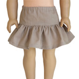 Fits 18" dolls

Includes: skirt

Taupe skirt with ruffle. Elastic waist. 100% cotton.