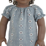 Fits 18" dolls
Includes: top
Woven top with daisy print. Elasticized neck and cuffs. Short sleeves. Velcro closure in back.
Fabric: 100% cotton.
Color: denim