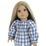 Fits 18" dolls

Includes: top

Woven top with shirred bodice. Elasticized neck and cuffs. Long sleeves. Velcro closure in back.

Fabric: 100% cotton.

Color: blue and white