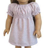 Fits: 18" dolls like American Girl and Our Generation

Includes: dress

Dress with shirred bodice and sleeves.  Elasticized neck.  Velcro closure in back.

Fabric: 100% cotton

Color: lavender