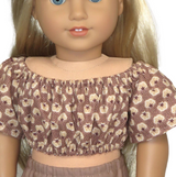 Fits: 18" dolls
Includes: top
Crop peasant top with elastic waist and neck. Velcro closure in back.
Fabric: cotton
Color: brown, tan