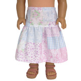 Fits: 18" dolls
Includes: skirt
Two-tiered midi skirt. Elastic waist. Floral and gingham print.
PRINT PLACEMENT WILL VARY.
Fabric: 100% cotton