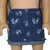 Fits: 18" dolls
Includes: skirt
Denim skirt with frayed edge folded up and sewn in place. Elastic waist. Gold thread trim.