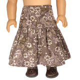 SK95.  18" doll skirt. Purple brown batik midi with flowers.