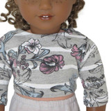 Fits: 18" dolls
Includes: top
Upcycled knit top with 3/4 sleeves and Velcro closure in back. Boho floral design.
PLEASE NOTE: the design placement will vary on each shirt.
Color: gray, white, pink, blue