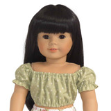 Fits: 18" dolls
Includes: top
Crop peasant top with elastic waist, neckline, and cuffs. Velcro closure in back.
Fabric: 100% cotton
Color: green, white