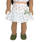 Fits 18" dolls
Includes: skirt
Mini skirt with ruffle. Elastic waist. Satin bow accent.
Fabric: 100% cotton
Color: white, green