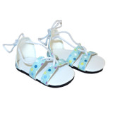 Fits 18" doll like American Girl doll

Light blue sandals with colorful dots and elastic straps.