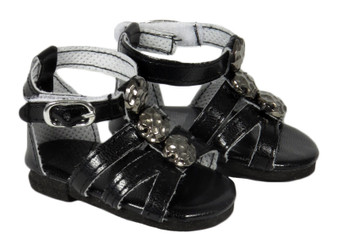Fits: American Girl doll

Black sandals with studs, silver buckles, and Velcro closures on straps. 