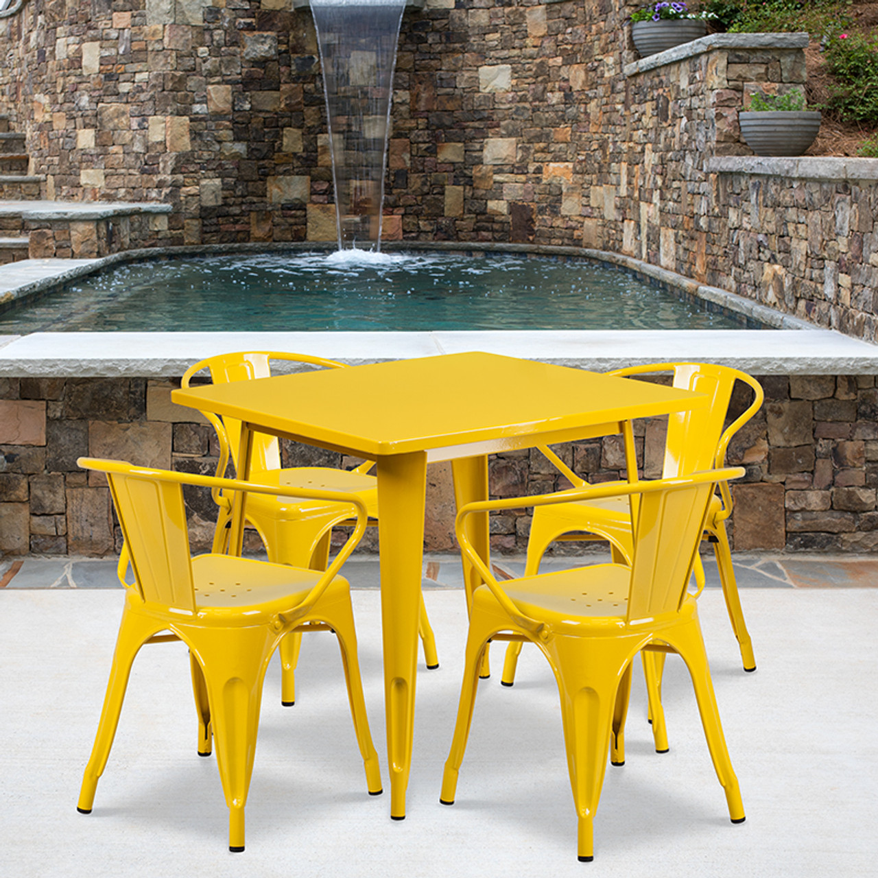 yellow metal table and chairs