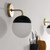 Stellar 1-Light Wall Sconce EEI-5655-OPA-SBR