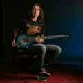PRS SE Mark Holcomb Signature Electric Guitar in Holcomb Blue Burst - SEMHHHL-PRS-SE-Mark-Holcomb-Blue-Burst-Lifestyle.jpg