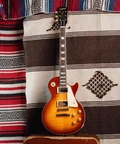 Epiphone Inspired by Gibson Custom 1959 Les Paul Standard Reissue Electric Guitar in Golden Poppy Burst - ECLPR9GPNH1-Lifestyle.jpg