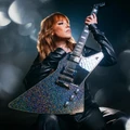 Epiphone Lzzy Hale Signature Explorer Custom Electric Guitar in Black Diamond Holographic Sparkle - EILHEXDSNH-Artist-Angle.jpg