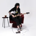 Positive Grid Spark Pedal Bundle With Link Wireless System - SPARK-PEDAL-Female-Guitarist.jpg