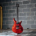 PRS Tekton Hardtail Electric Guitar in Bloodstone Red - 1178921D-Lifestyle.jpg