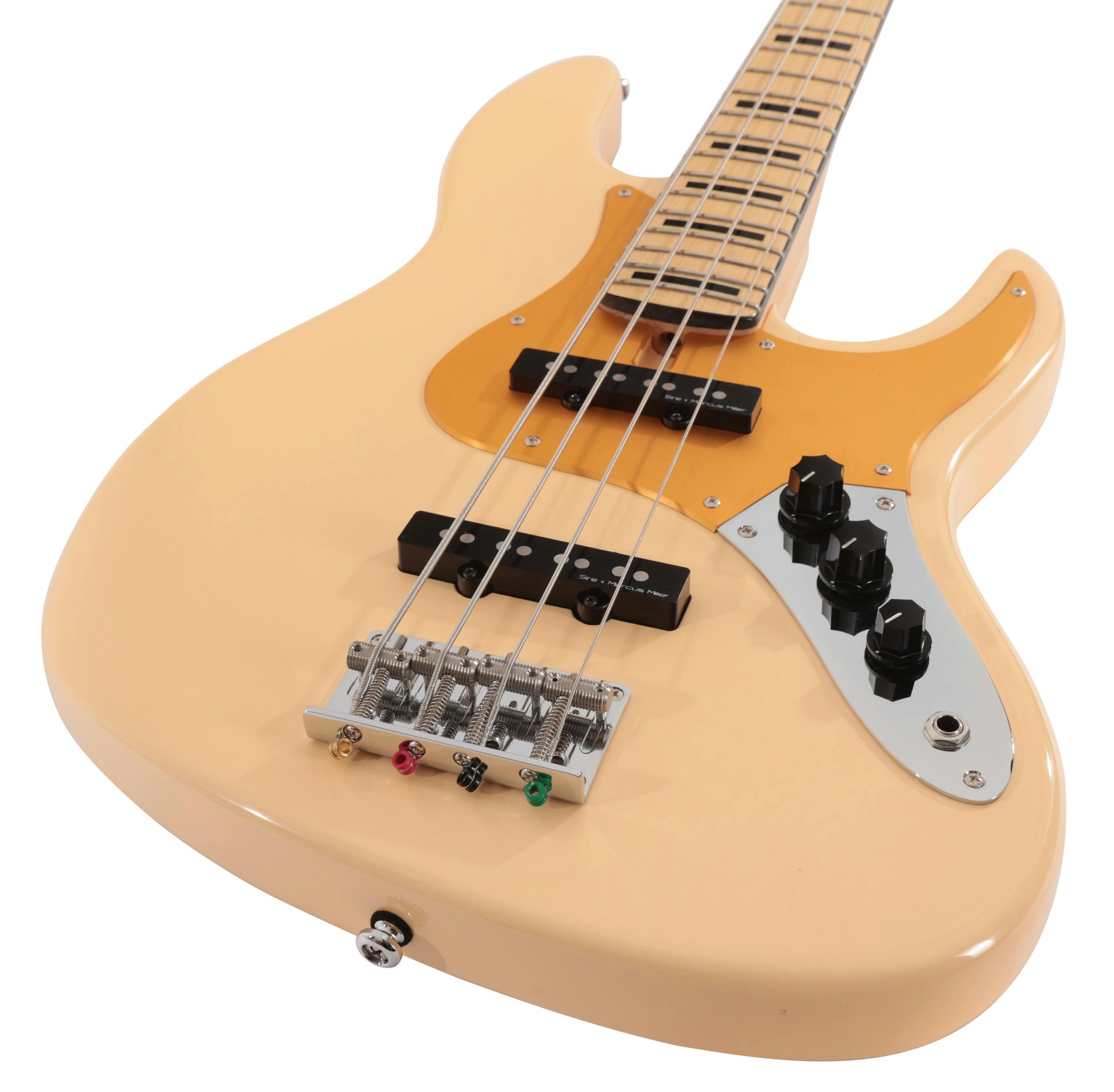 Sire Marcus Miller V5 24 Fret 4-String Bass Guitar in Vintage White - SIRE24V54VWH-Sire-V5-24-Fret-4-String-Bass-Vintage-White-Angle.jpg