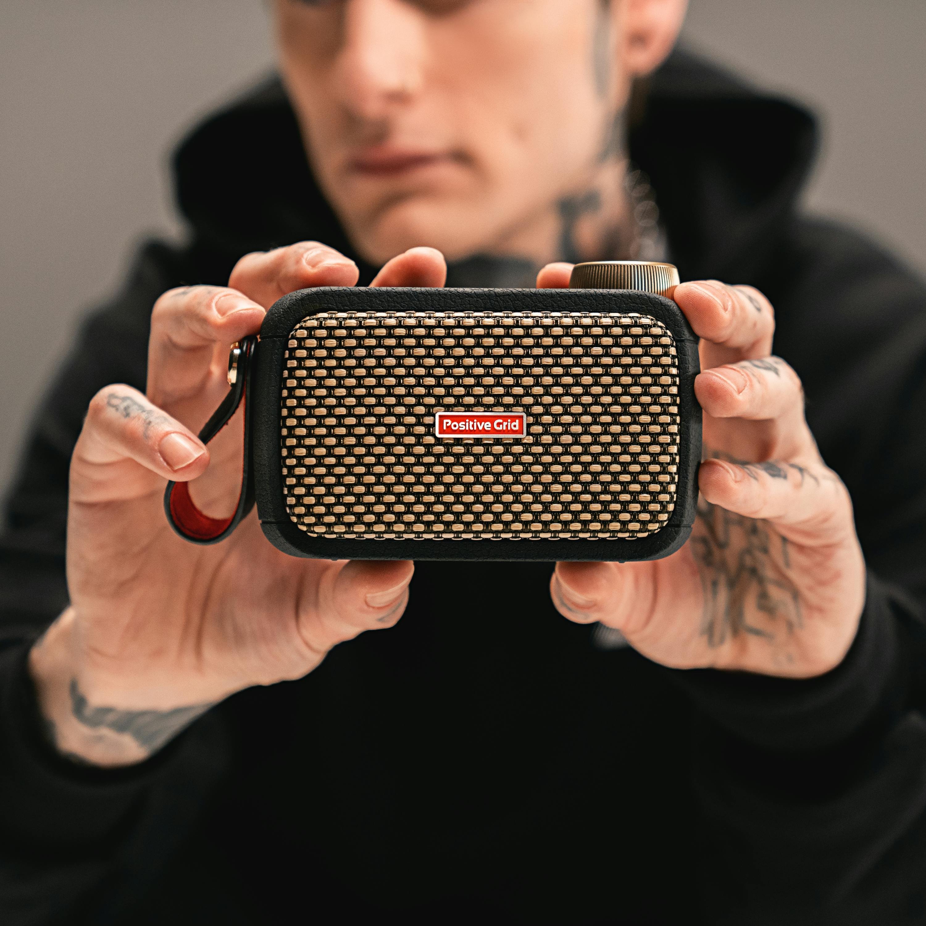 Positive Grid Spark GO Ultra-Portable Smart Guitar Amp & Bluetooth Speaker - SPARK-GO-Positive-Grid-Spark-Go-Amp-Hands.jpg