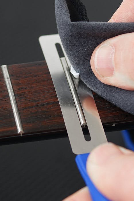 MusicNomad GRIP Guards - Premium Polishing Templates for All Fret Sizes - 444485-2_MN124 in action.jpg